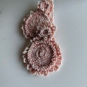 Fashion statement earrings. About 3in long, felt back.